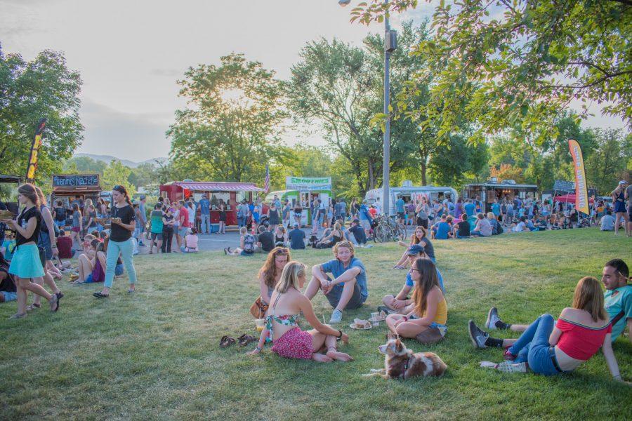 Groups of people gather and mingle at the Fort Collins Food Truck Rally on July 10.
(Sara Graydon | Collegian)