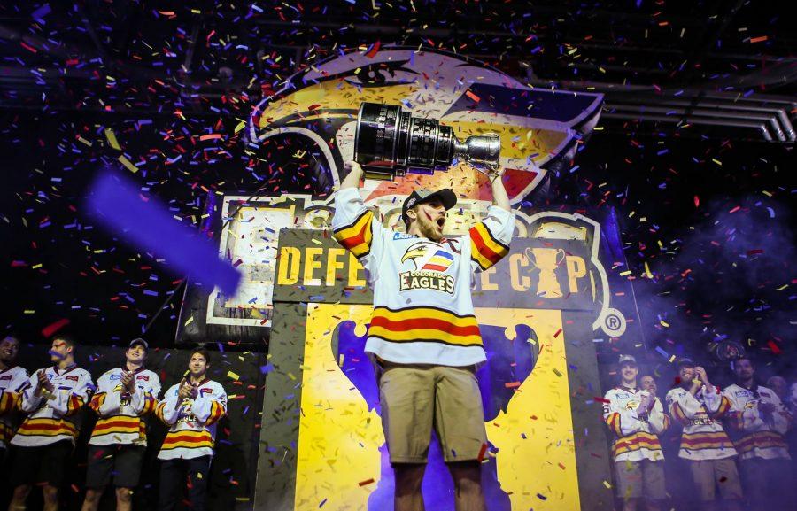 Colorado Eagles captain Matt Garbowsky lifts the Kelly Cup above his head during a fan celebration event at the Budweiser Events Center. The Eagles won the East Coast Hockey League championship for the second year in a row and celebrated by presenting the trophy to fans and signing autographs. (Photo Courtesy of Tony Villalobos-May | Colorado Eagles)