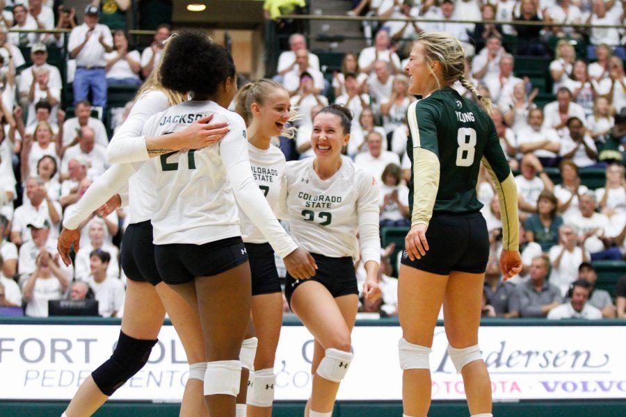 The Rams celebrate after a good play against Illinois. The Rams lost in the fifth set. (Ashley Potts | Collegian)