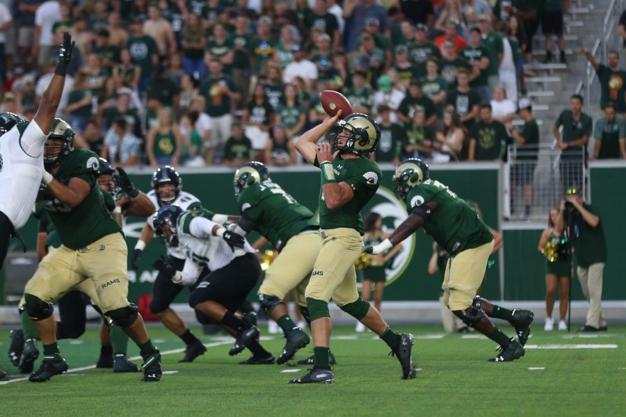 Colorado State Quarterback K.J. Carta-Samuels attempt to make a pass from the pocket during the third quarter of play against the Hawaii Rainbow Warriors. The Rams fell to the Warriors 43-34 at Canvas Stadium on August 25, 2018 in Fort Collins, CO. (Elliott Jerge | Collegian)