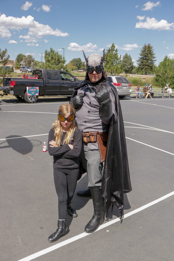 Chase and Zelia Stillson pose as Batman and Catwoman outside of the Fort Collins Comic Con. (Devin Cornelius | Collegian)