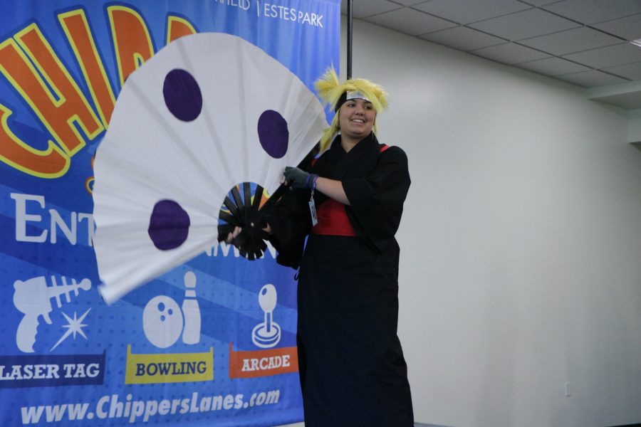Arielle poses on the catwalk at the Comc Con dressed as Temari from the anime naruto. (Devin Cornelius | Collegian)
