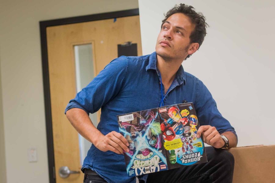 James Lopez, CSU alumni and co-organizer of Fort Collins Comic Con, enjoys reading comic books when he is not working alongside his colleagues to make Fort Collins Comic Con an enjoyable convention for all. (Cassie Alfaro | Collegian)