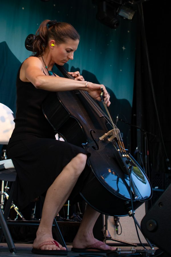 Beth Rosbach played the cello with the Otis Taylor band at New West Fest on Aug. 10, 2018 in Fort Collins, Colo.— (Sara Graydon | Collegian)