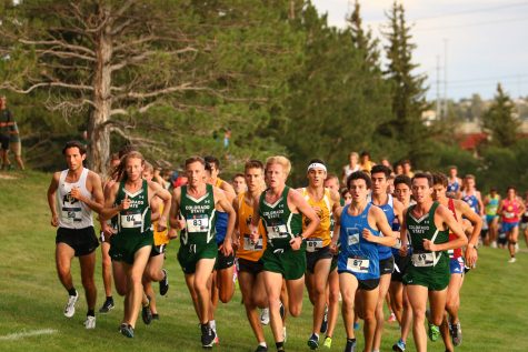 The Mens Cross Country team leads the race during the Wyoming Invite in Cheyanne on Aug. 31. The Rams won the meet with a total of 32 points with Eric Hamer, Cole Rockhold and Forrest Barton placing second through fourth. (Matt Begeman | Collegian)