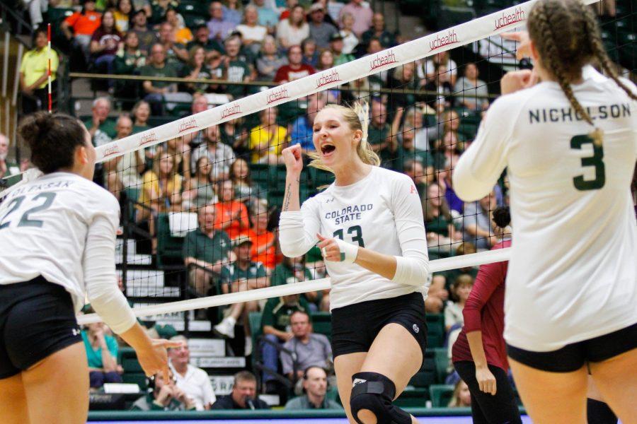 Kirstie Hillyer (13) celebrates a kill against Florida State. The Rams beat the Seminoles 3-2 after a close game. (Ashley Potts | Collegian)