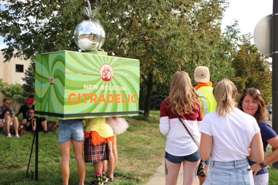 People wait in a line to try New Belgium's Cirtadelic experience. (Devin Cornelius | Collegian)