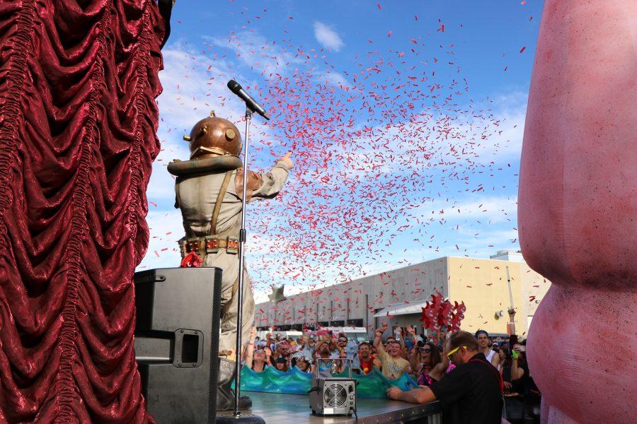 Members of the ArtsyFartsy collective wrap up the show with confetti and a giant octopus. (Devin Collegian)