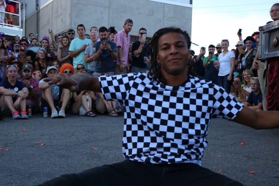 A member of the ArtsyFartsy collective does a fantastic flip for the camera and audience. (Devin Cornelius | Collegian)