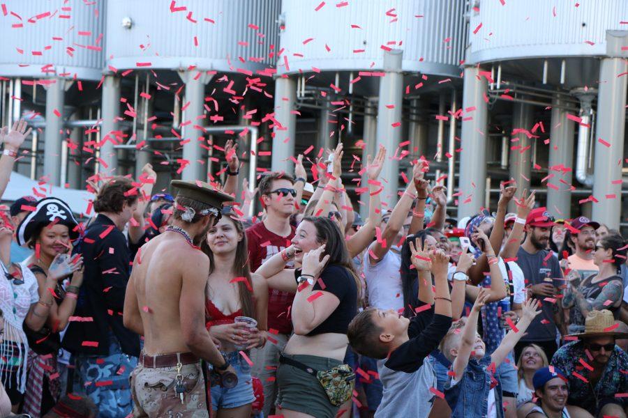 People cheer after the final act of the Artsy Fartsy collective. (Devin Cornelius | Collegian)