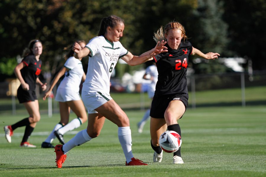 Lexi Swenson battles an Eastern Washington player for the ball. (Ashley Potts | Collegian)