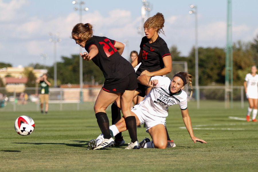 Emma Skinsky fights to make a pass with two Eastern Washington players around her. (Ashley Potts | Collegian)