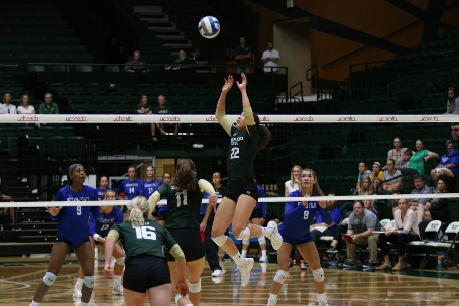 Katie Oleksak sets Maddi Foutz during their game against ISU (Devin Cornelius | Collegian)