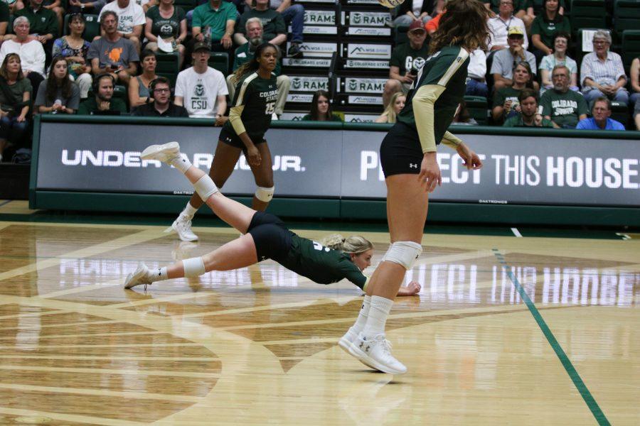 Maddi Foutz (#16) dives to keep the ball from touching the ground. (Devin Cornelius | Collegian)