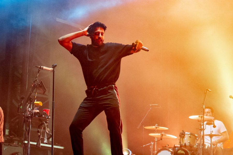 Sameer Gadhia performs with Young the Giant at Grandoozy on Sept. 15. (Ashley Potts | Collegian)