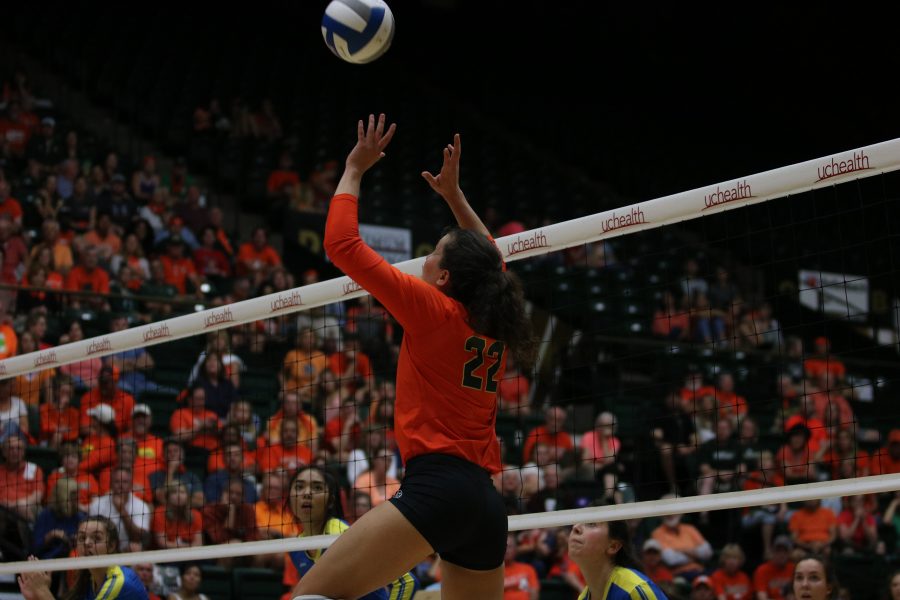 Katie Oleksak jump sets the ball for her teammates. (Devin Cornelius | Collegian)