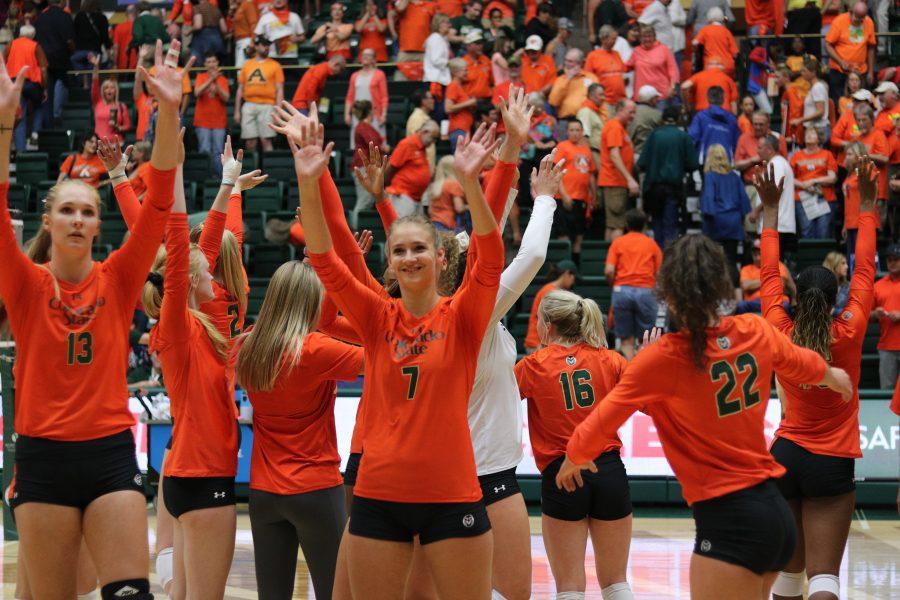 The CSU volleyball team waves to the croud after their electric performance. (Devin Cornelius | Collegian)