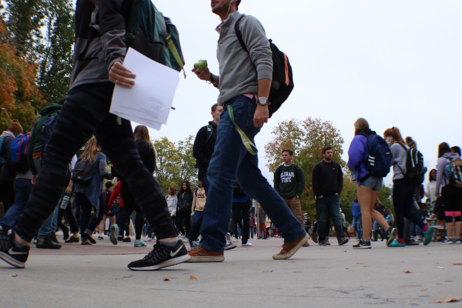 Students walk to their next classes on Friday. (Devin Cornelius | Collegian)