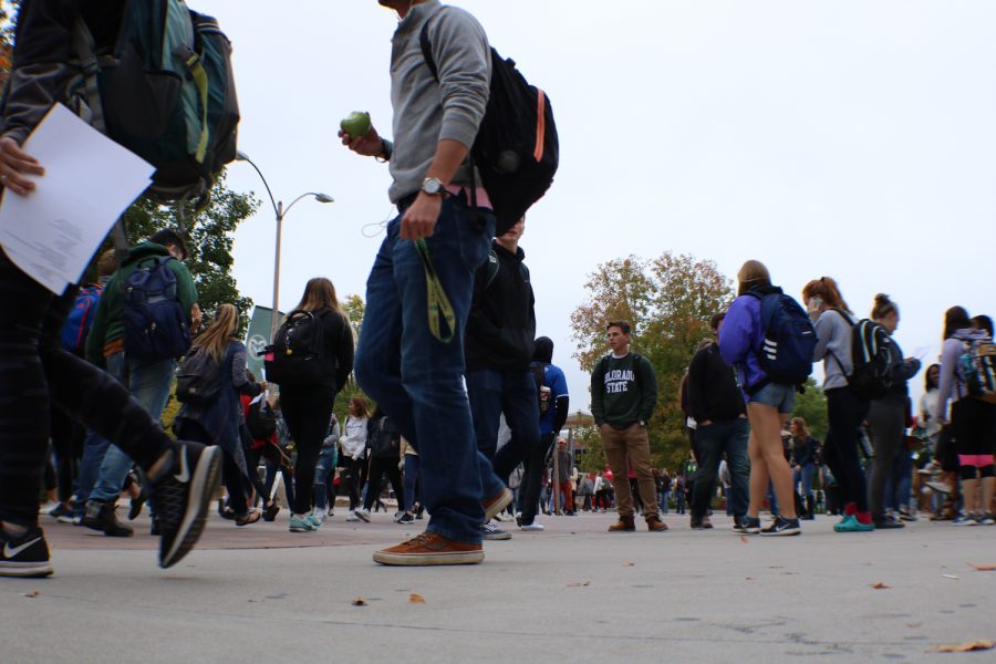 Students walk to their next classes on Friday. (Devin Cornelius | Collegian)