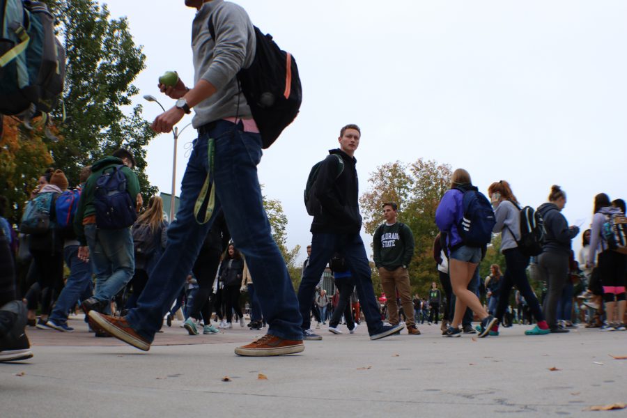 Students walk to their next classes on Friday. (Devin Cornelius | Collegian)