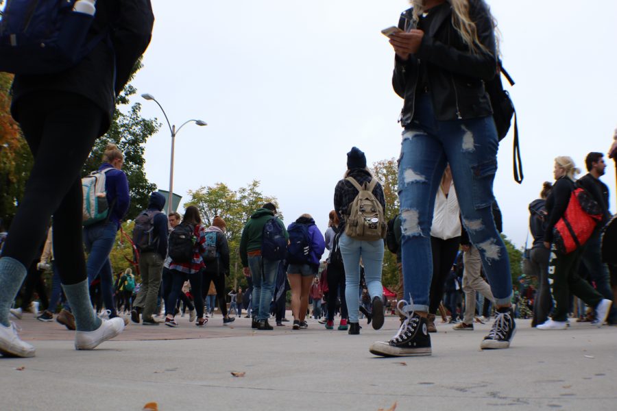 Students walk to their next classes on Friday. (Devin Cornelius | Collegian)
