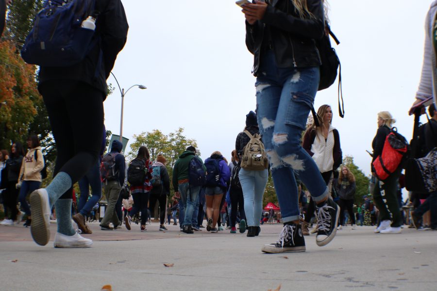 Students walk to their next classes on Friday. (Devin Cornelius | Collegian)