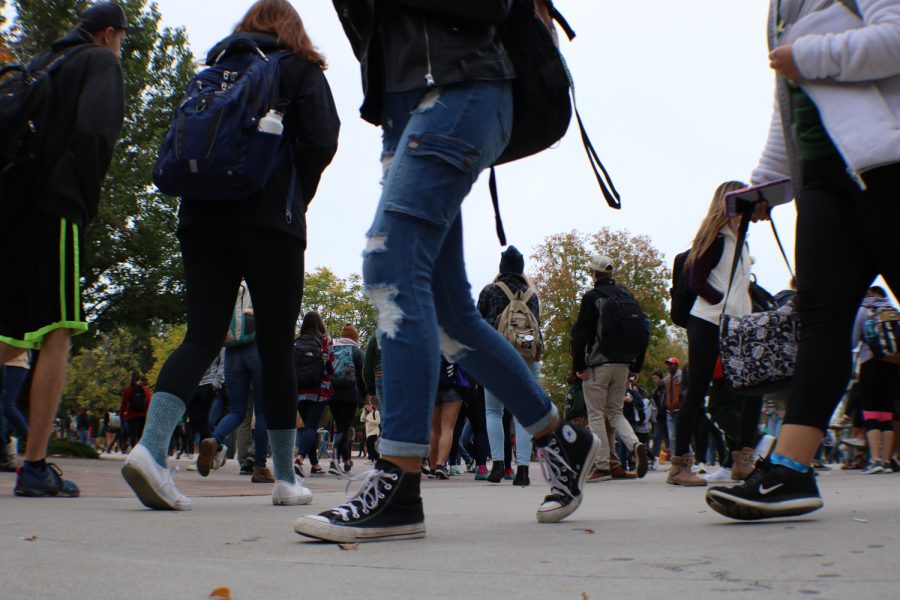 Students walk to their next classes on Friday. (Devin Cornelius | Collegian)
