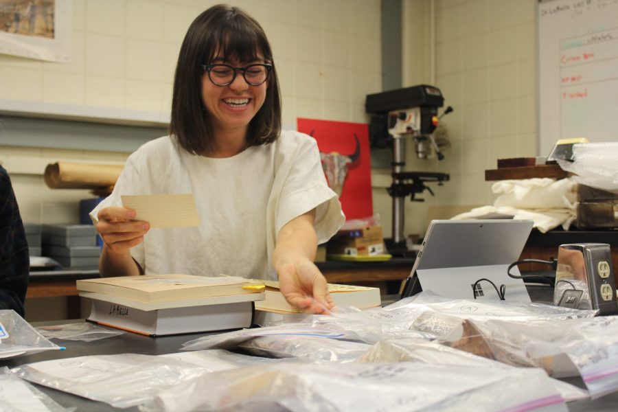 Graduate Archeology student Marie Taylor works in her lab on a private collection of artifacts such as stone and arrow heads that were sent in to be analyzed and documented. Through taking an Anthropology class during her undergraduate degree, Taylor found her interest in Archeology and wanting to learn more about the history of people. (Matt Begeman | Collegian)