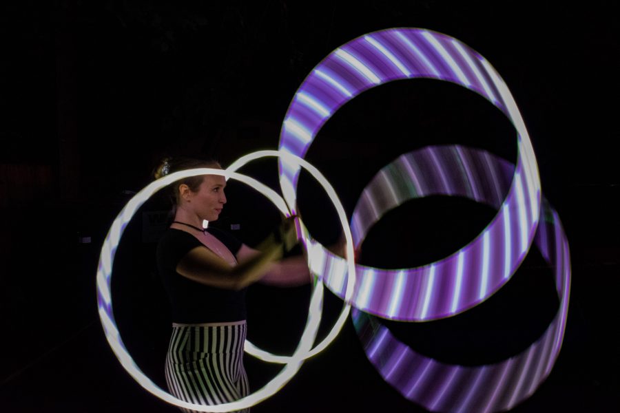 Madison McBurney hula-hoops with 4 hoops. “I have been hooping for 6.5 years,” said McBurney. “My favorite part of hooping is how it makes my body and mind feel. Learning new tricks and skills makes me feel good about myself and it’s also a great workout.” McBurney was part of the award-winning Hoop Troupe, The Hustletown Hoopers who won a hoopie award from hooping.com in 2017. (Sara Graydon | Collegian)