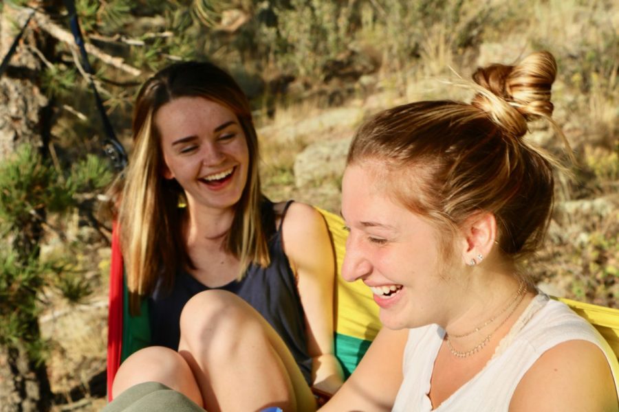 Miah Lingelbach and Cassie Brown enjoy an afternoon at Horsetooth Reservoir hammocking before the brisk fall weather starts to settle in. They take any chance they can get to get away from the chaos of school to relax in the warm Colorado sun. (Joe Oakman | Collegian) 