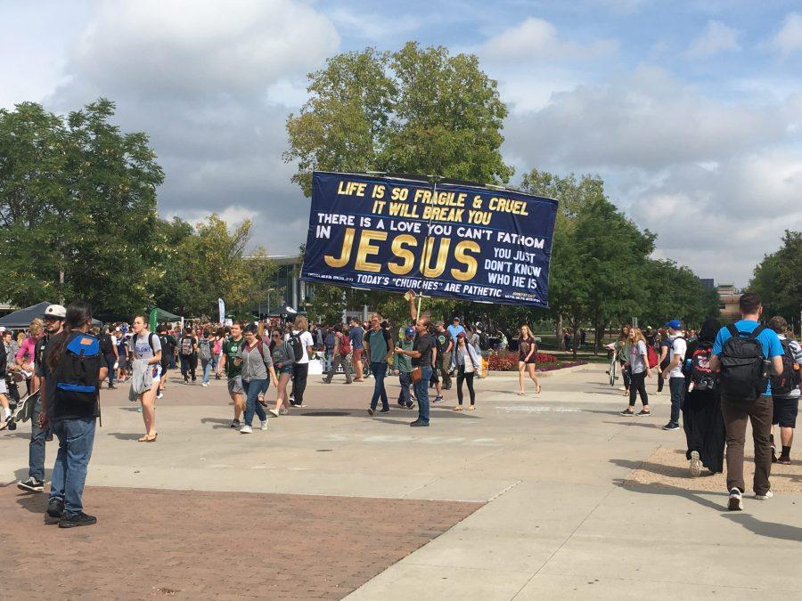 Colorado State Universitys plaza receives a huge wave a preachers the fall semester of 2018.  God is good, rang through the air as students maneuvered around the eager evangelists. (Photo courtesy of Claire Oliver). 