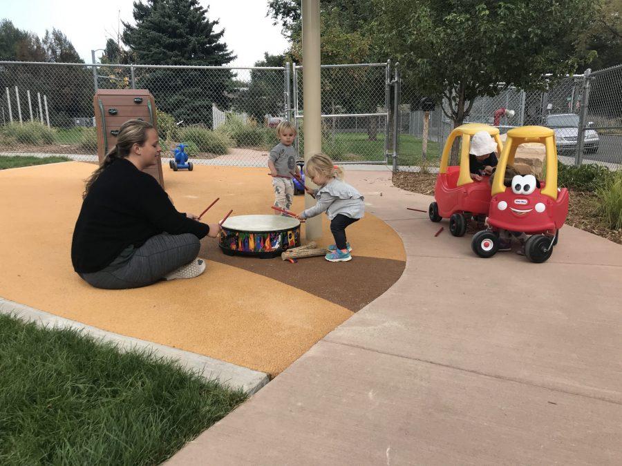 Children play in the new playground at the Early Childhood Center (Emma Iannacone | Collegian)