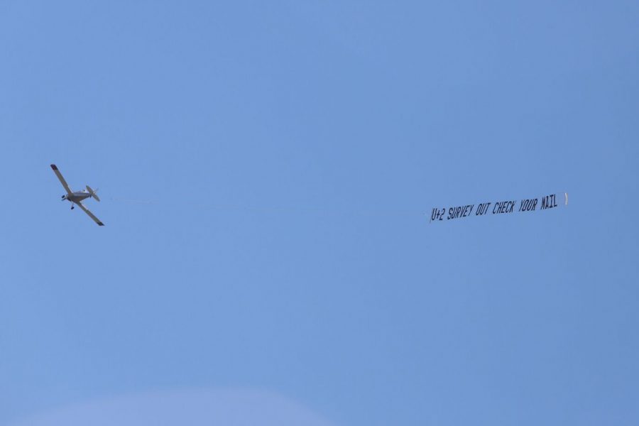 A plane flies over campus on Sept. 18 telling students to check their mail for a U+2 survey. The plane and advertisement was payed for by ASCSU in an effort to reach more students. (Brooke Buchan | Collegian)