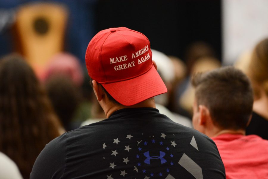 An audience member during Charlie Kirk and Candace Owens Campus Clash tour wears a MAGA hat. (Colin Shepherd | Collegian)