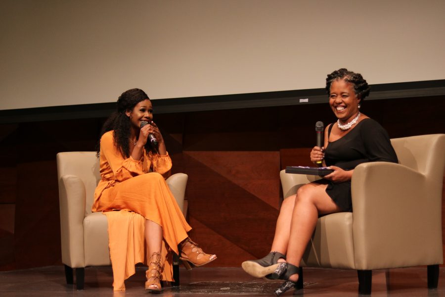 Jaquikeyah Fields makes the audience and B/AACC Director Bridgette Johnson laugh during the question portion of the pageant. (Devin Cornelius | Collegian)