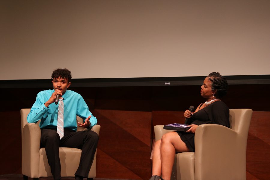 Donovan Reed explains to the crowd why the drinking age should be lowered. (Devin Cornelius | Collegian)