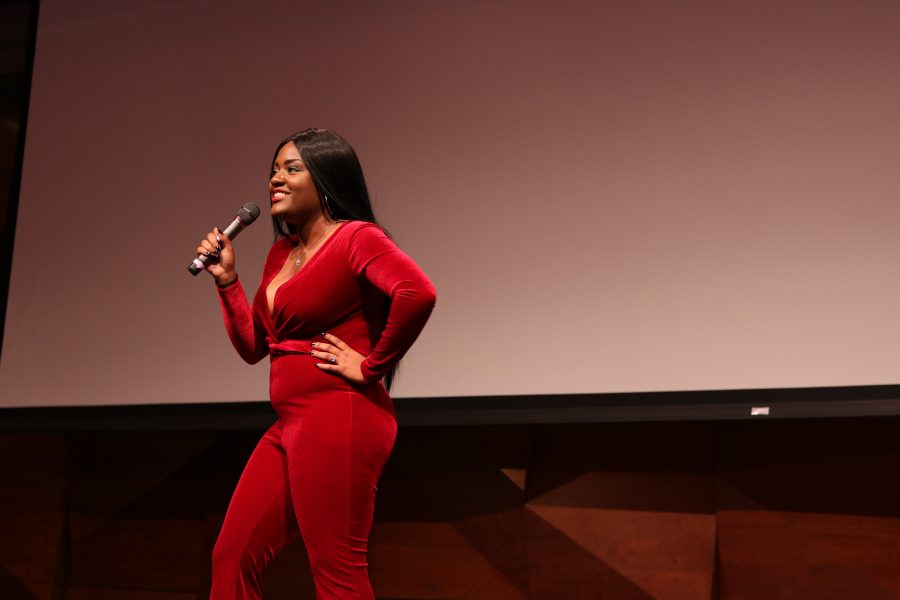 Ahjina Hopkins tells a story as her act during the talent part of the pageant. (Devin Cornelius | Cornelius)