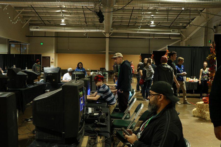 People relax and play retro video games during  Vincon. (Devin Cornelius | Collegian)