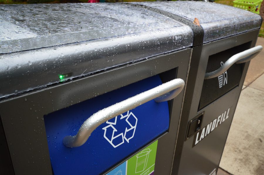 CSU's new solar-powered trash and recycling bins blink green, as they show they are charged. (Mackenzie Pinn | Collegian)