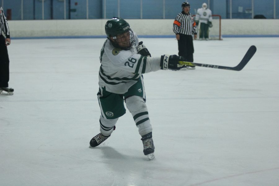 Corey Taylor (26) Shoots the puck towards the Arizona goal during the game. (Devin Cornelius | Collegian)