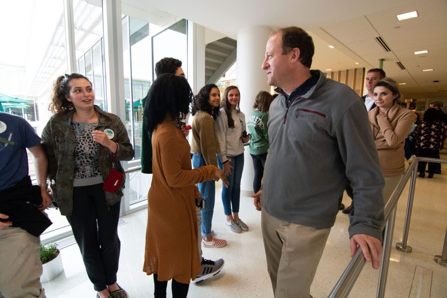 Colorado Governor candidate Jared Polis greets people in line while they are waiting to enter a Colorado Democrats rally in the Lory Student Center on Wednesday Oct. 24, 2018. The rally consists of guest appearances by Jared Polis, Michael Bennet, Joe Neguse, and Bernie Sanders. (Colin Shepherd | Collegian)