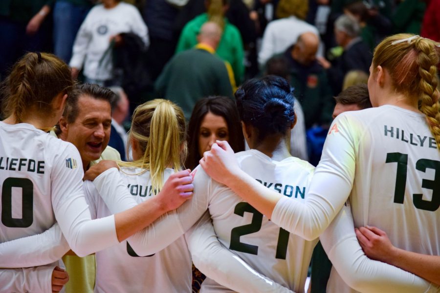 Tom Hilbert, coach of the CSU womens volleyball team, speaks to the team after their win against San Diego State on Thursday October 25, 2018. (Alyse Oxenford | Collegian)