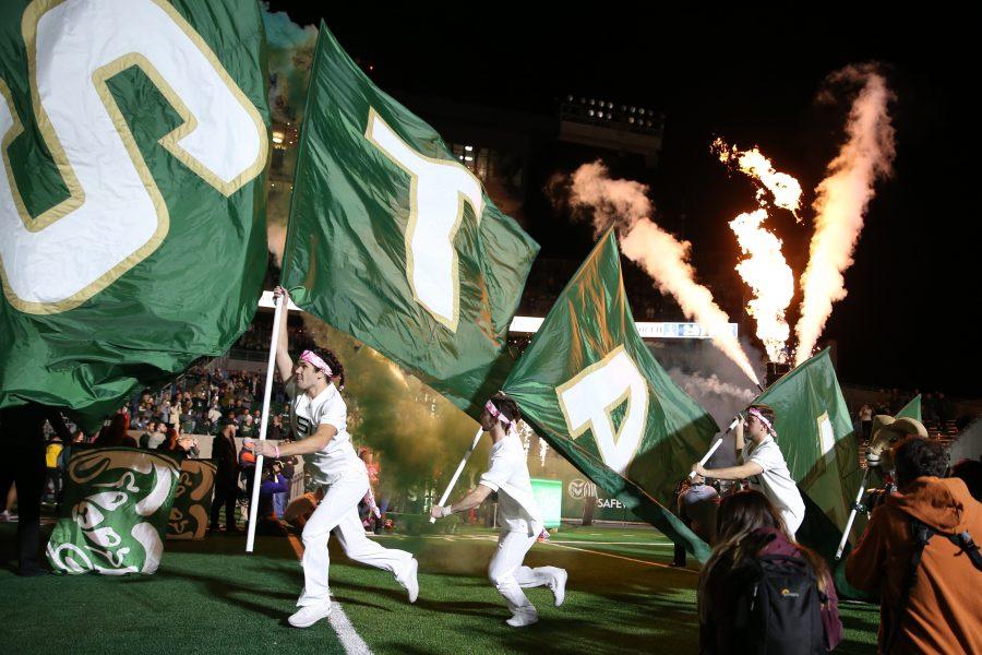 Colorado State Cheerleaders run out of the tunnel ahead of the Football Team prior to kick off against the Wyoming Cowboys on Oct 26. The Rams are down 3-0 at halftime at Canvas Stadium. (Elliott Jerge | Collegian)