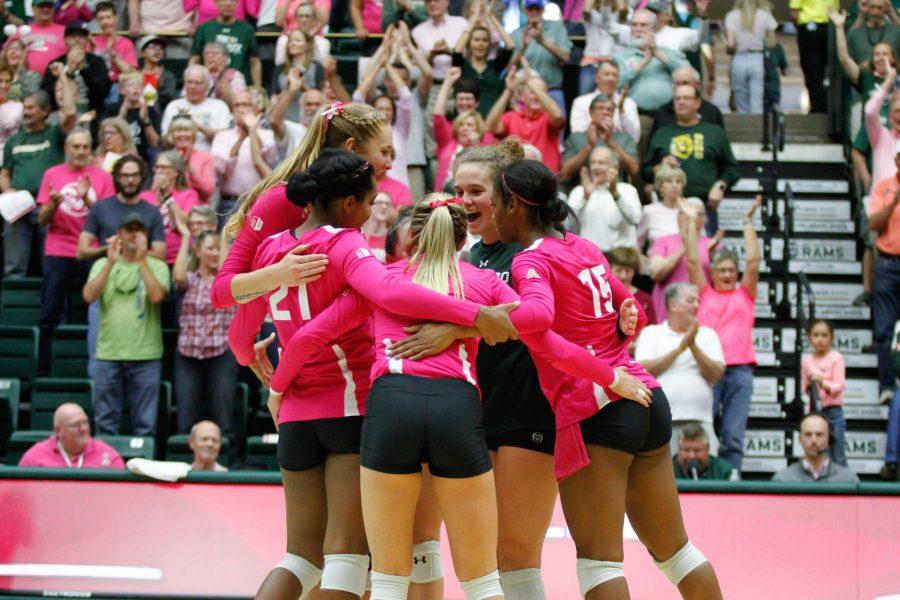 The Rams celebrate after the game winning point in the third set of the game against Fresno State. The Rams swept the Bulldogs in three sets. (Ashley Potts | Collegian)