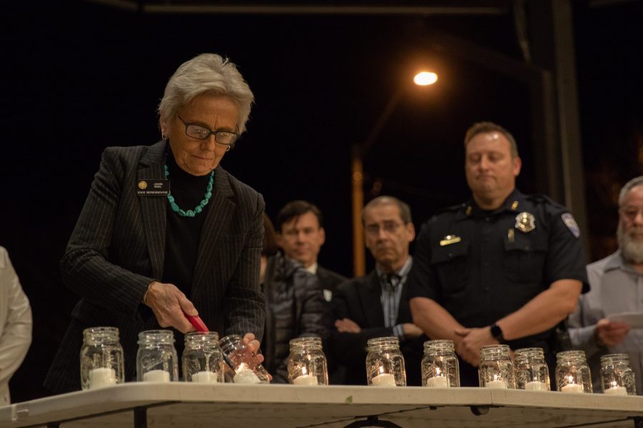 State representative Joann Ginal, D-CO, is one of the 15 people to light the candles at the candlelight vigil. (Nathan Tran | Collegian)