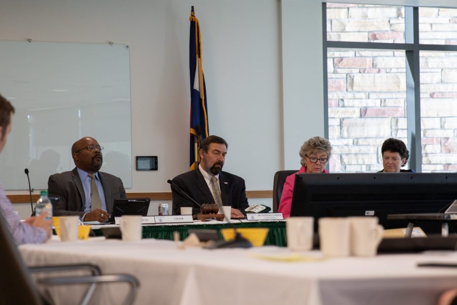 D. Rico Munn, Executive Chair, Tony Frank, President, Nancy Tuor, Vice Chair, and Jane Rhodes, Treasurer, conclude a Board of Governors meeting after discussing important matters. (Nathan Tran | Collegian)