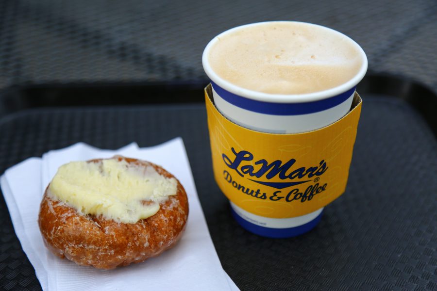 For the fall season, LeMars Donuts and Coffee offers pumpkin spice lattes and a pumkin spice donuts with cream cheese frosting. (Davis Bonner | Collegian)