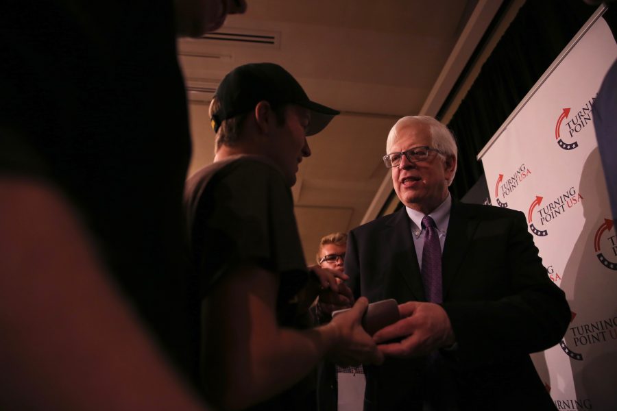 Conservative radio talk show host Dennis Prager, right, chats with Tyler Hanson, left, following his speech on campus on Oct. 29, 2018. (Forrest Czarnecki | Collegian)