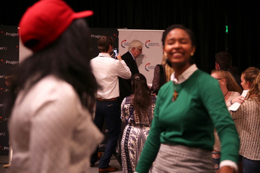Conservative talk show host Dennis Prager, center, talks to supporters following his speech on campus on Oct. 29, 2018. (Forrest Czarnecki | Collegian)