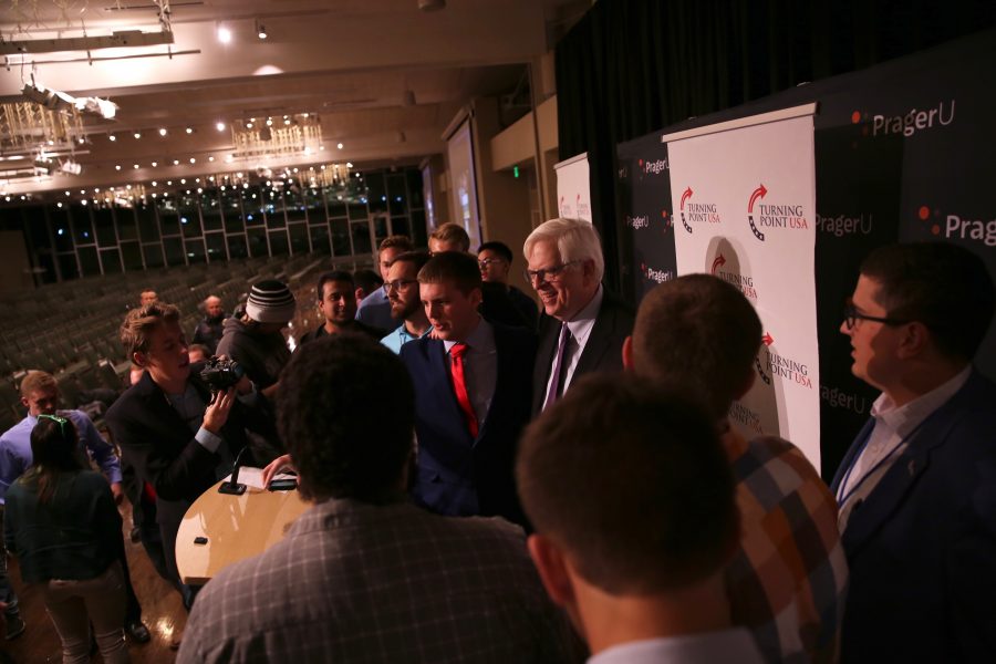 Conservative radio talk show host Dennis Prager chats with supporters and poses for photos following his speech on campus on Oct. 29, 2018. (Forrest Czarnecki | Collegian)